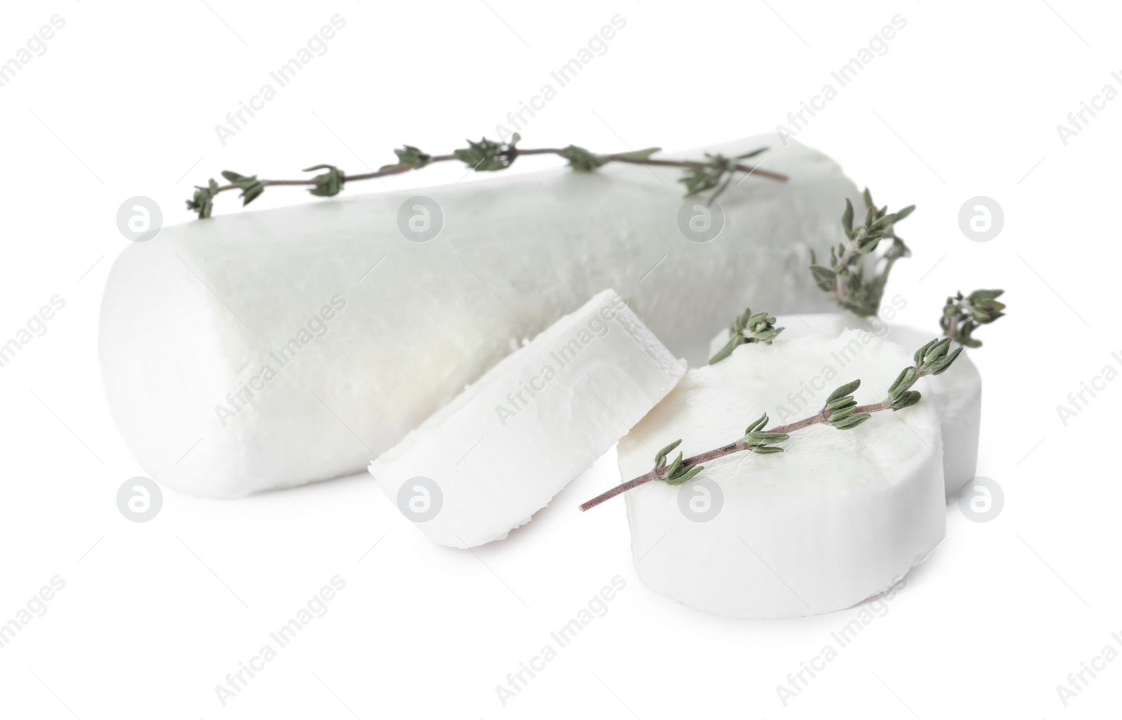 Photo of Delicious goat cheese with thyme on white background