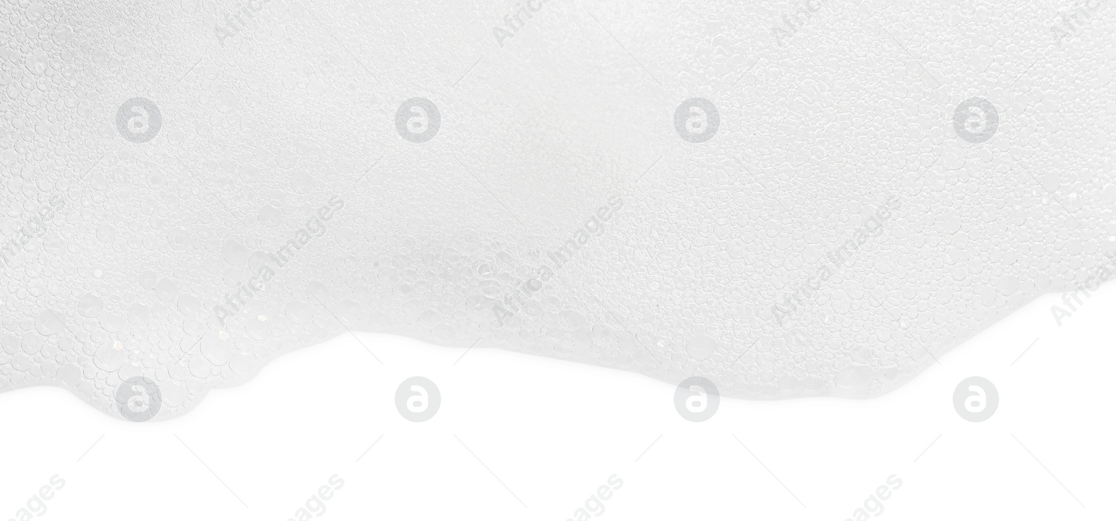 Photo of Fluffy soap foam on white background, top view