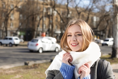 Photo of Portrait of beautiful young woman outdoors on sunny day