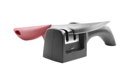 Modern handheld sharpener and knife on white background