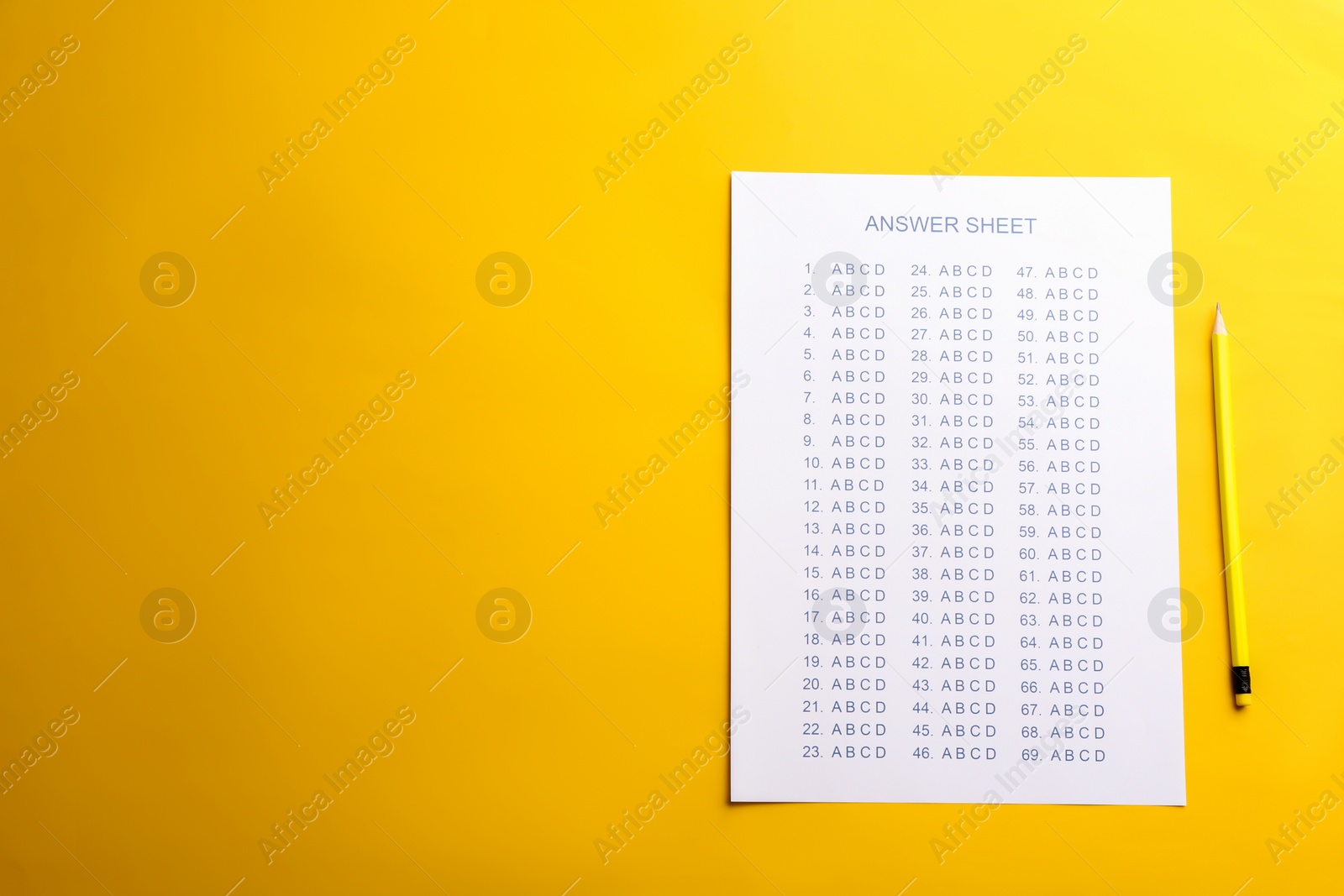 Photo of Answer sheet and pencil on color background, top view with space for text