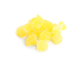 Photo of Delicious yellow candied fruit pieces on white background