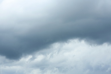 Photo of Sky with heavy rainy clouds on grey day