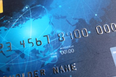 Photo of One plastic credit card as background, closeup