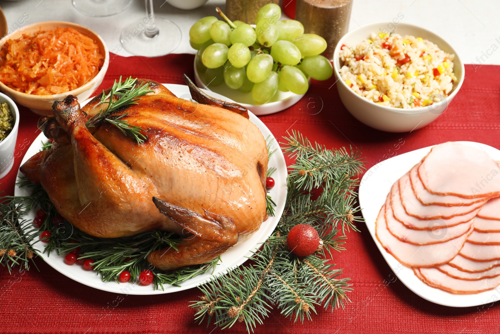 Photo of Traditional festive dinner with delicious roasted turkey served on table