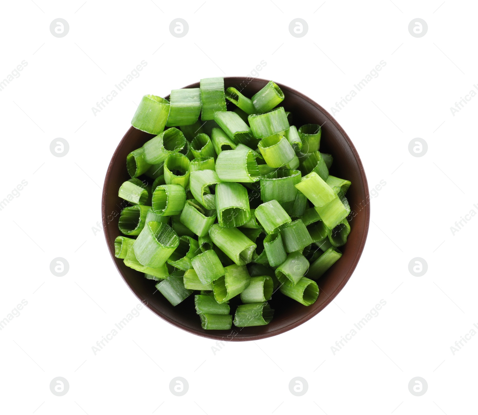 Photo of Bowl of cut green onion on white background, top view