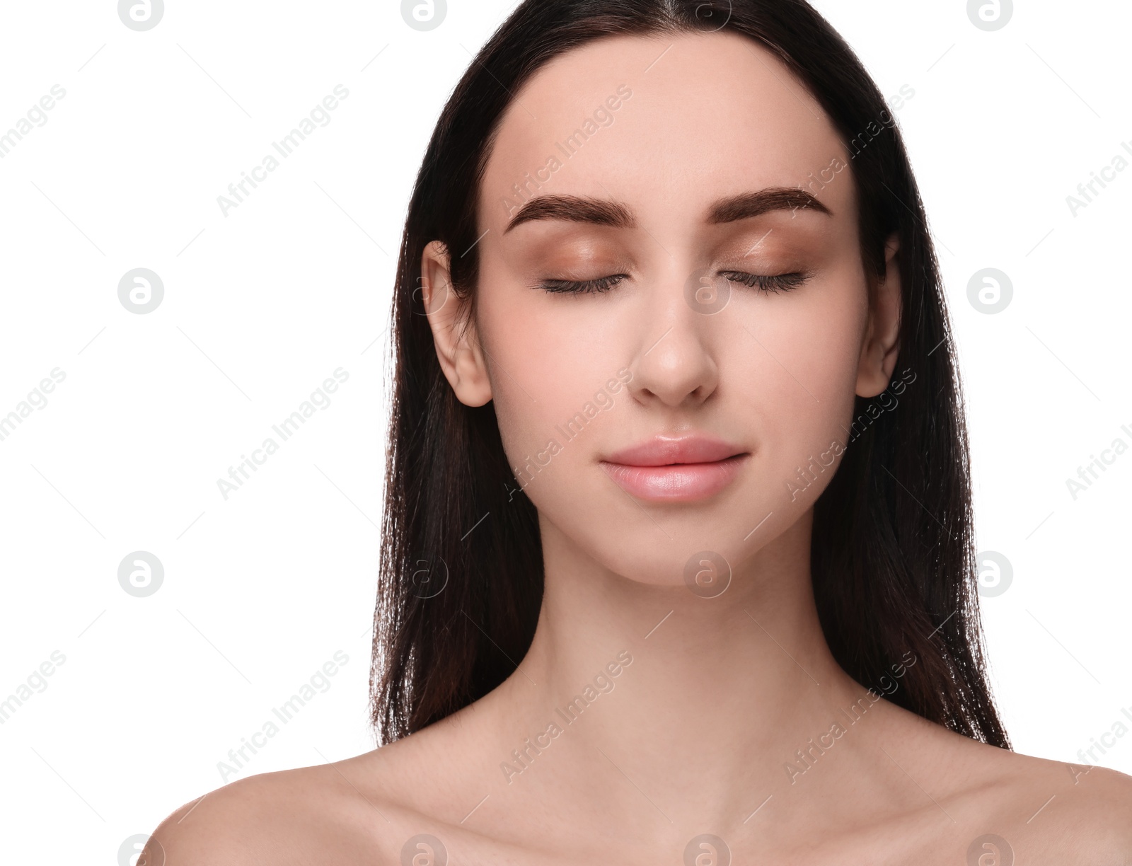 Photo of Portrait of attractive young woman on white background