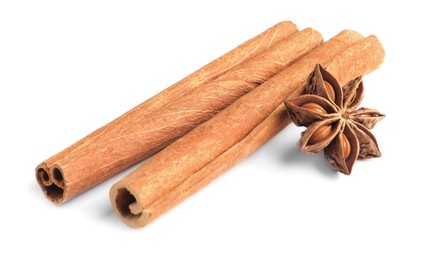 Cinnamon sticks and anise star isolated on white