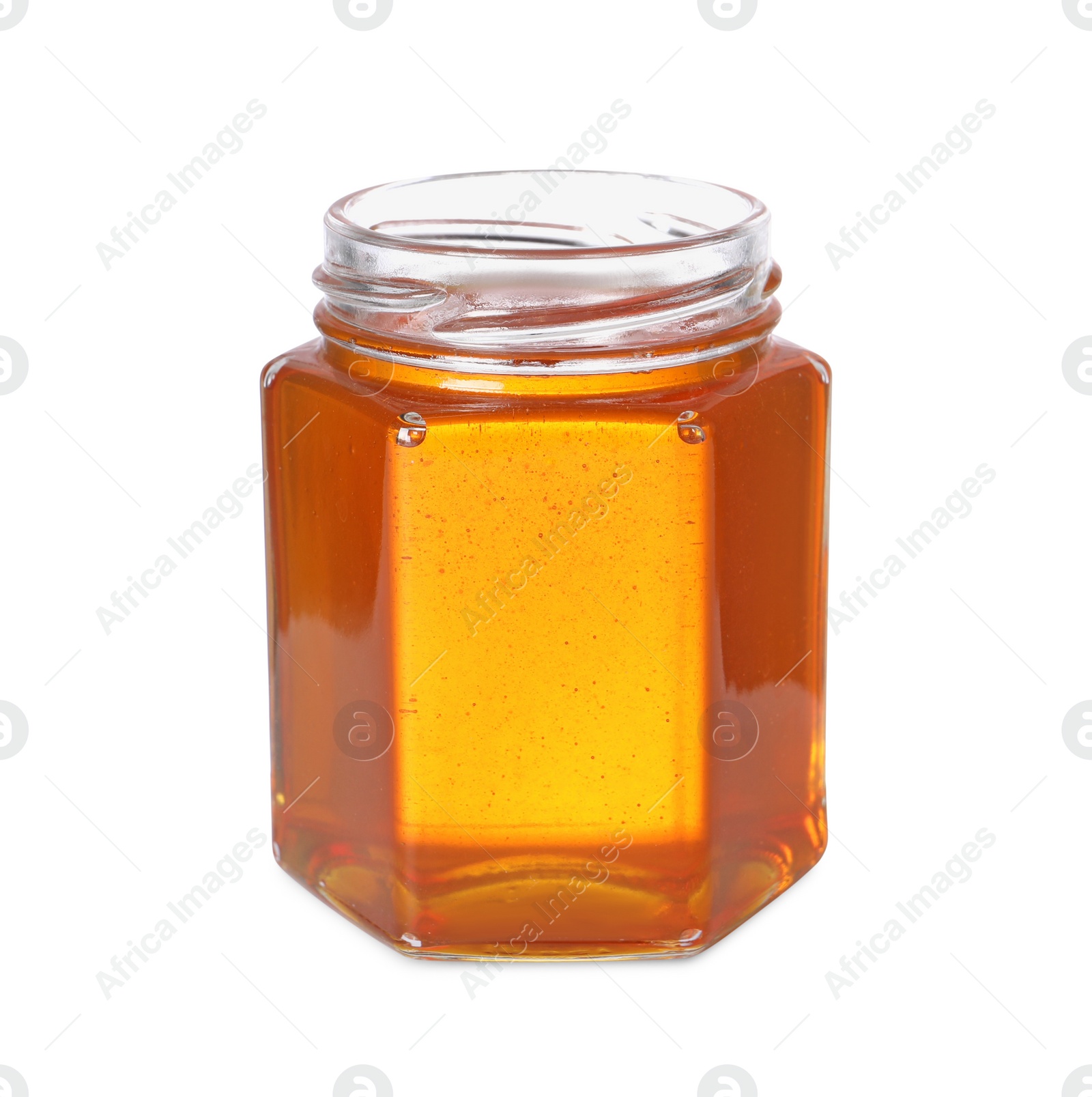 Photo of Tasty natural honey in glass jar isolated on white