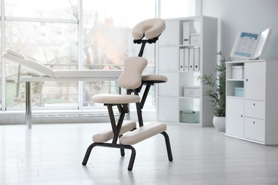 Modern massage chair in clinic. Medical equipment