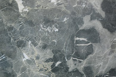 Texture of grey marble stone surface as background, closeup