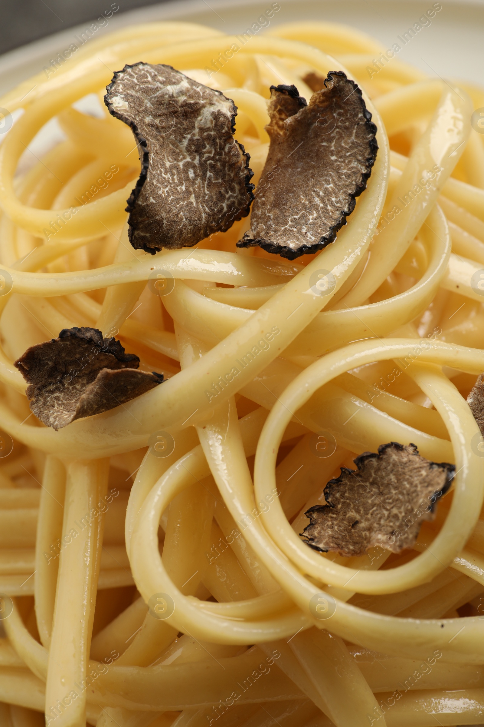 Photo of Closeup view of tasty fettuccine with truffle