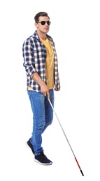 Blind man with long cane on white background