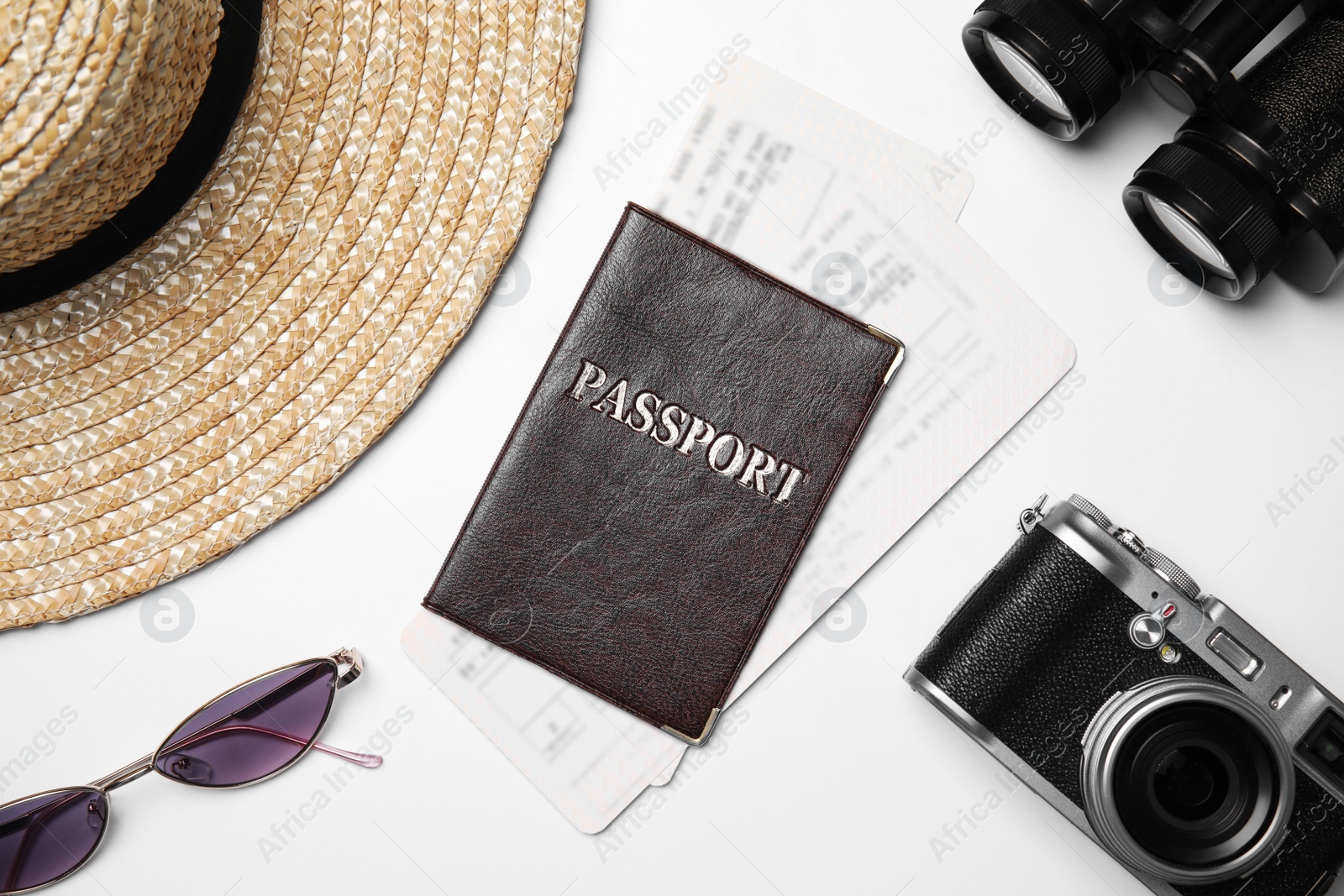 Photo of Flat lay composition with passport, tickets and holiday items on white background