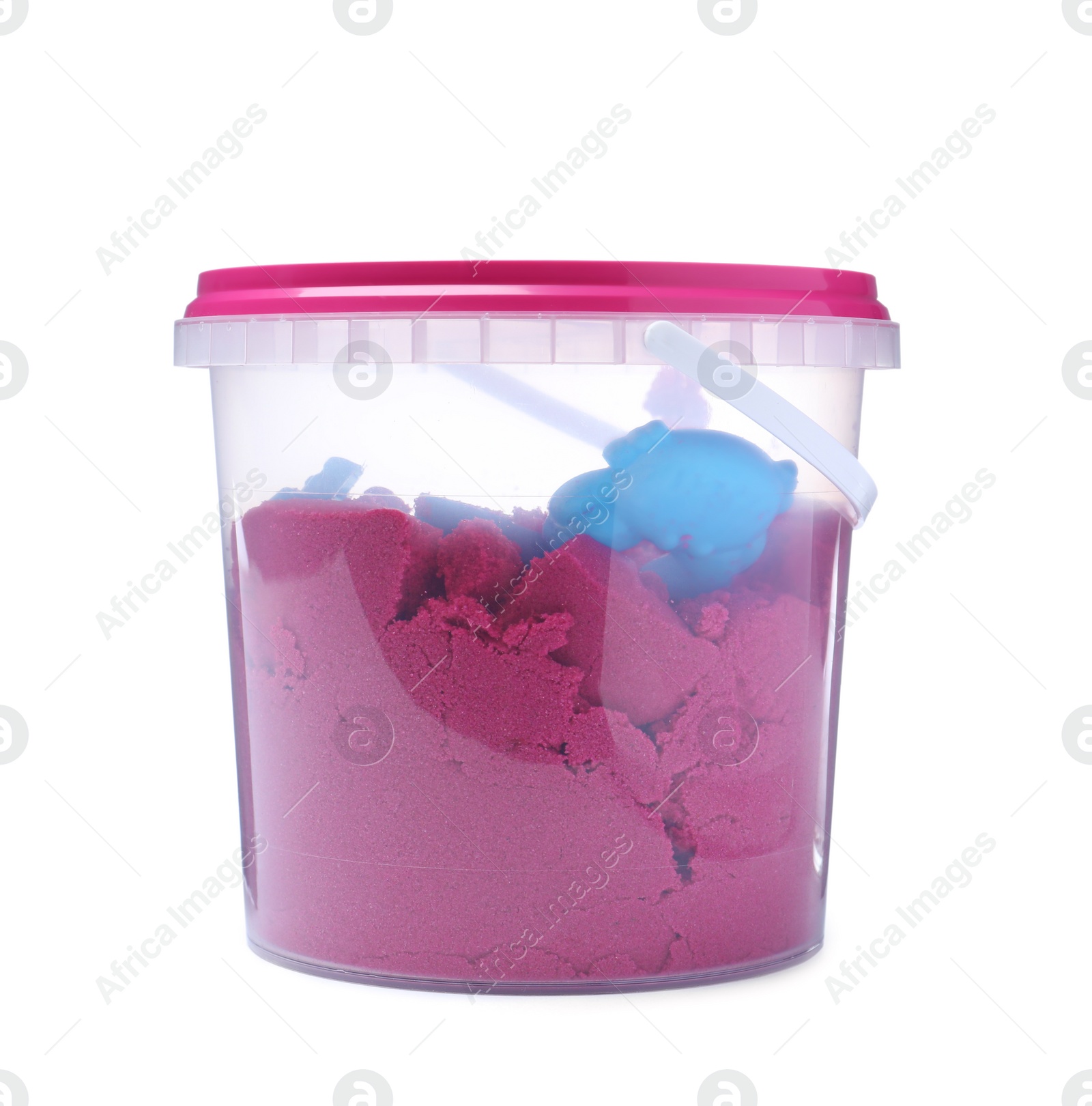 Photo of Kinetic sand and toy in bucket isolated on white