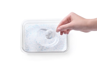 Photo of Woman taking laundry detergent from container on white background, top view