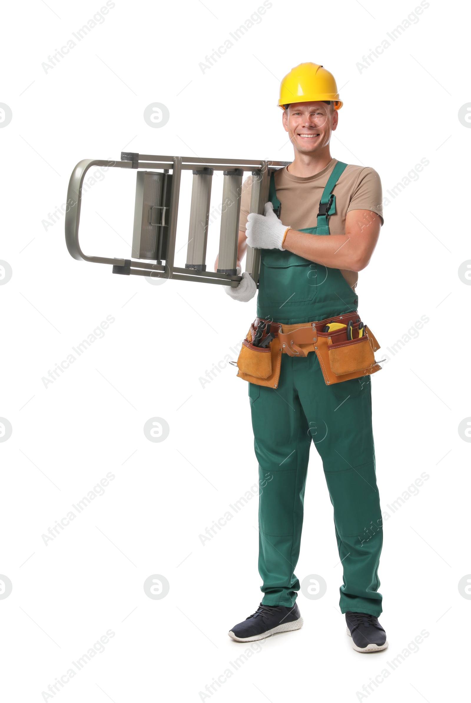 Photo of Professional constructor with ladder on white background