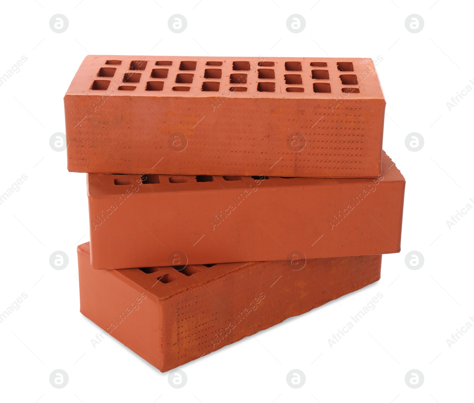 Photo of Red bricks on white background. Building material