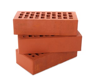 Photo of Red bricks on white background. Building material