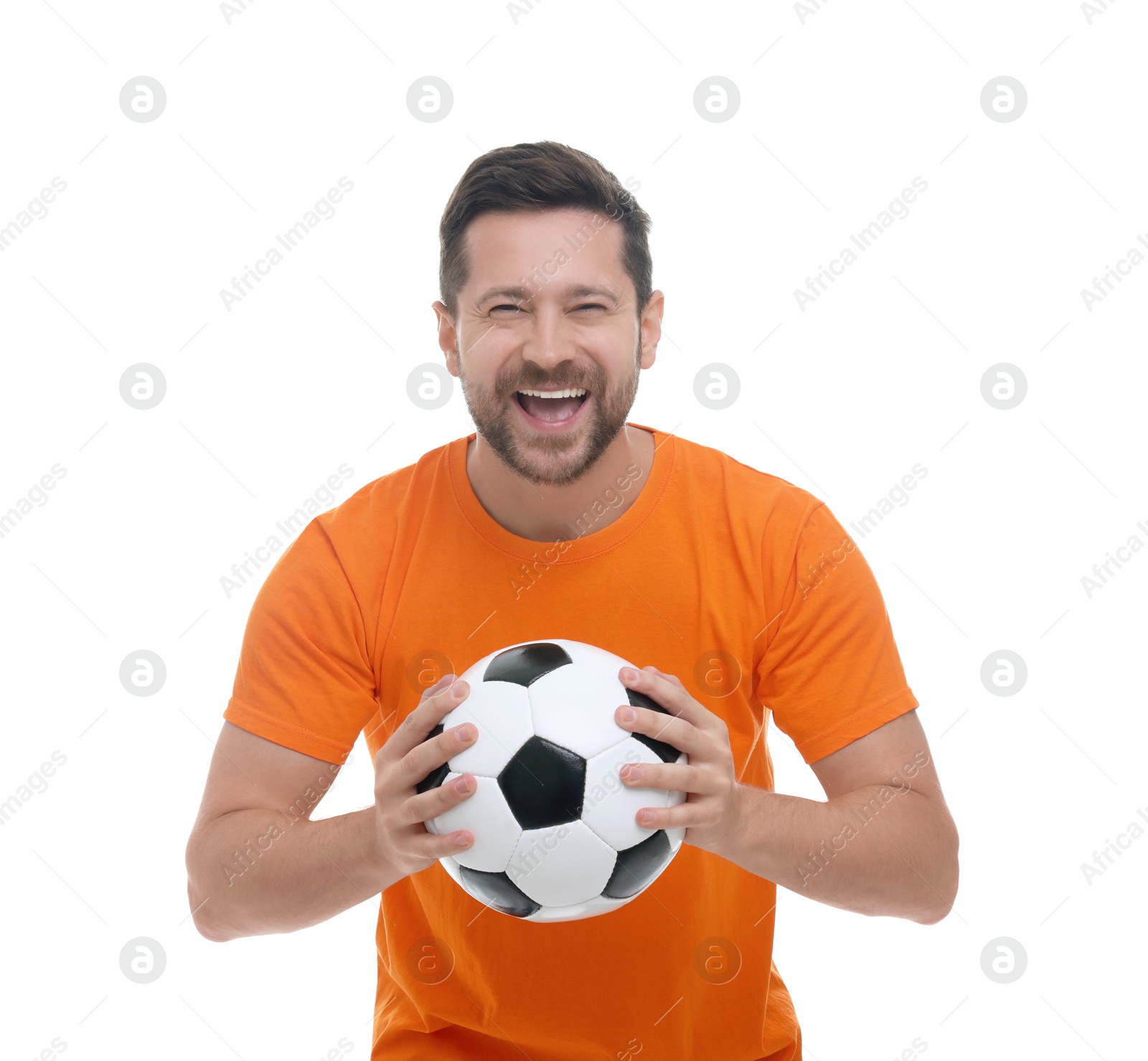 Photo of Emotional sports fan with ball celebrating on white background