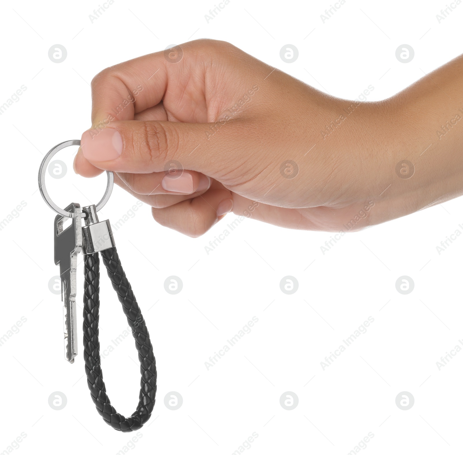 Photo of Woman holding key with black leather keychain on white background, closeup