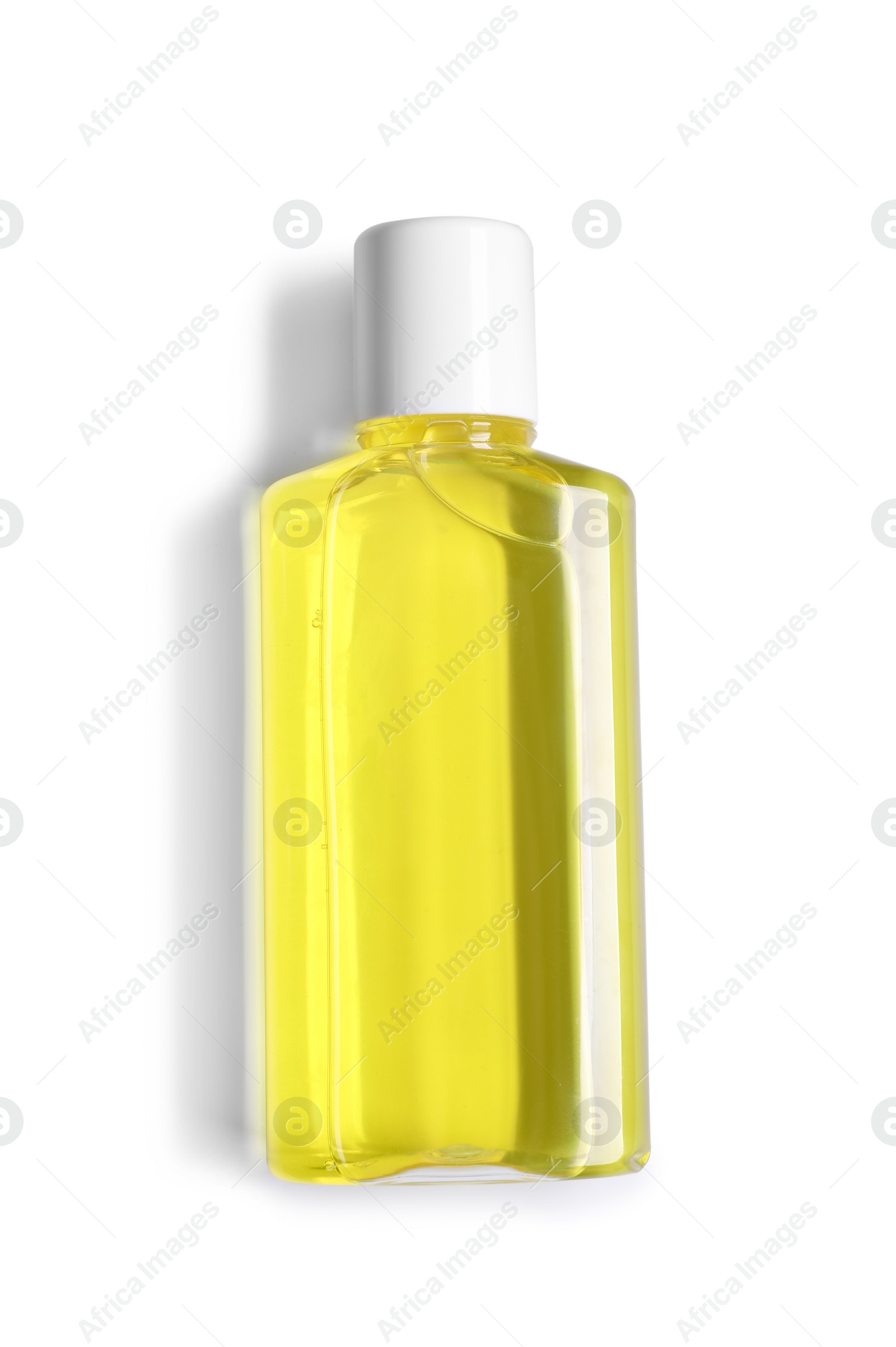 Photo of Fresh mouthwash in bottle isolated on white, top view