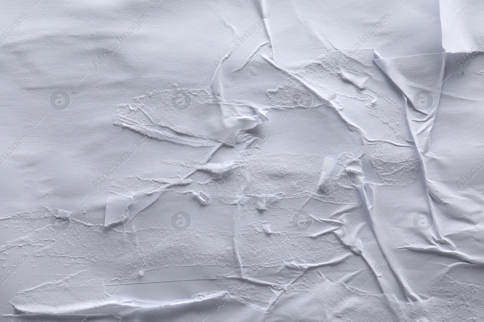 Photo of Texture of white creased paper as background, top view. Wall poster