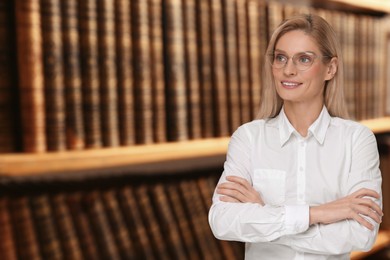 Image of Lawyer, consultant, business owner. Confident woman smiling on blurred background, space for text