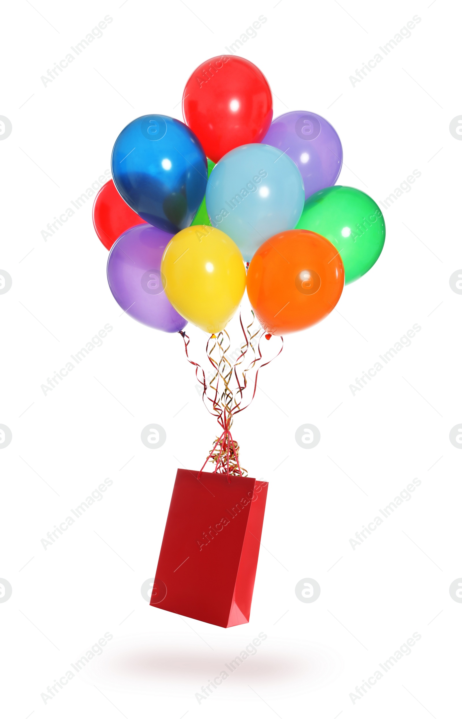 Image of Bunch of bright balloons and paper bag on white background