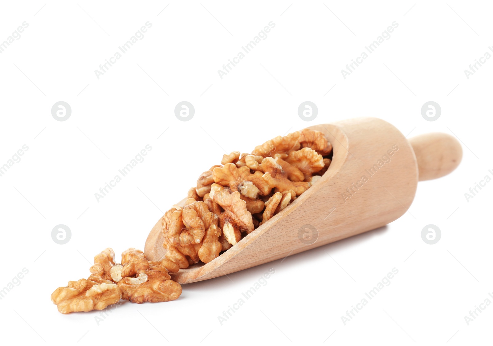Photo of Wooden scoop with tasty walnuts on white background