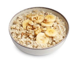 Tasty oatmeal with banana and walnuts in bowl isolated on white