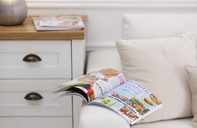 Culinary magazine on sofa in living room