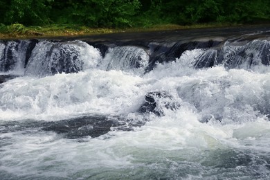 Photo of Picturesque view on beautiful river with rapids