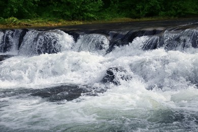 Picturesque view on beautiful river with rapids