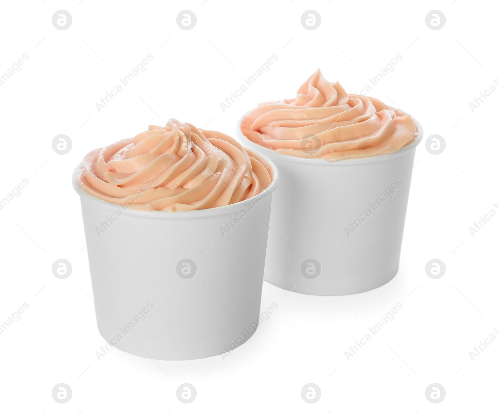 Photo of Cups with tasty frozen yogurt on white background