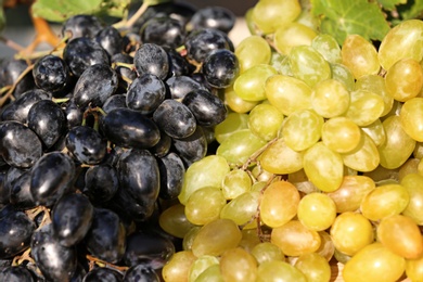 Fresh ripe juicy grapes as background, closeup