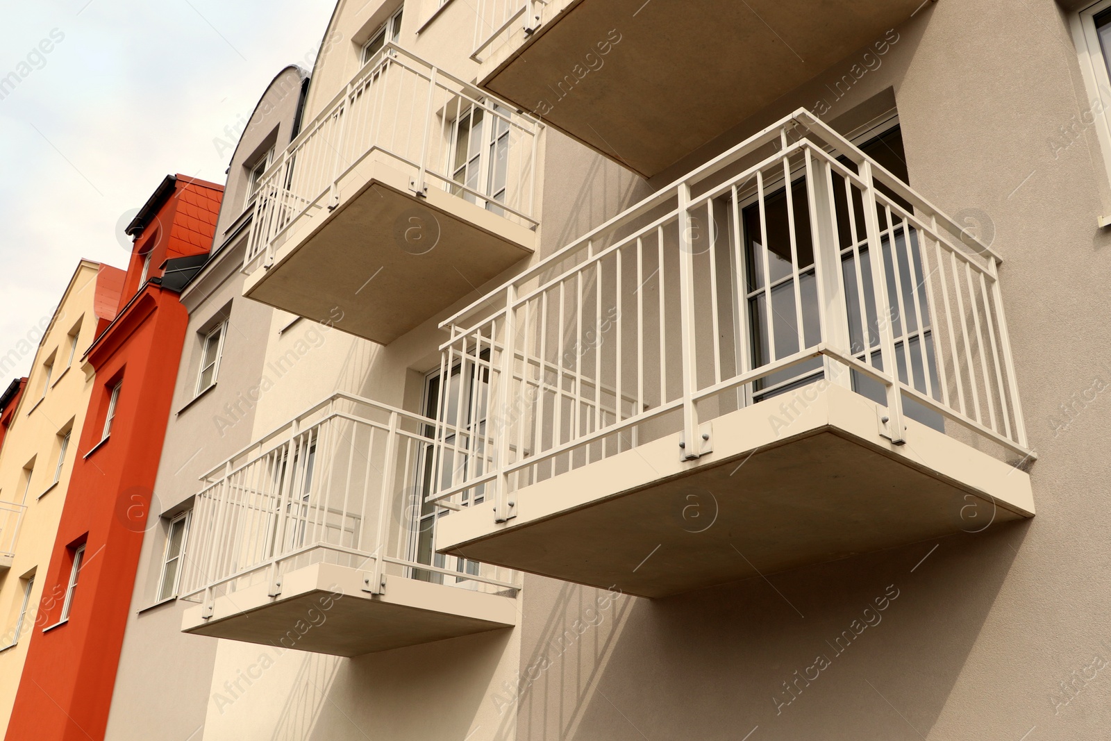 Photo of Exterior of beautiful building with empty balconies