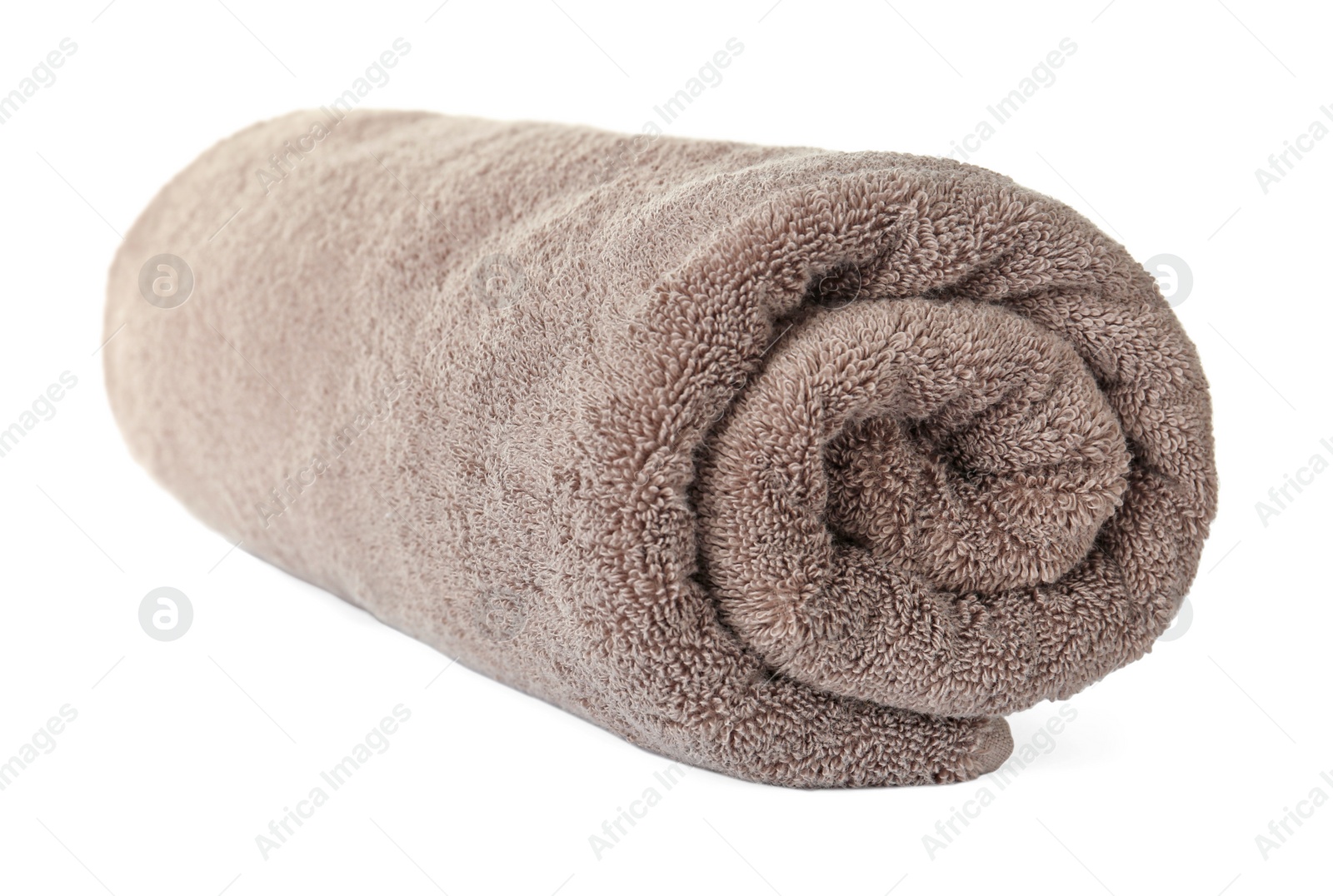 Photo of Rolled clean brown towel on white background