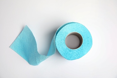 Photo of Toilet paper roll on white background, top view
