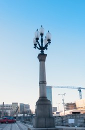 Beautiful street lamp outdoors on sunny day