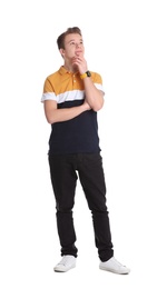 Portrait of thoughtful teenage boy on white background