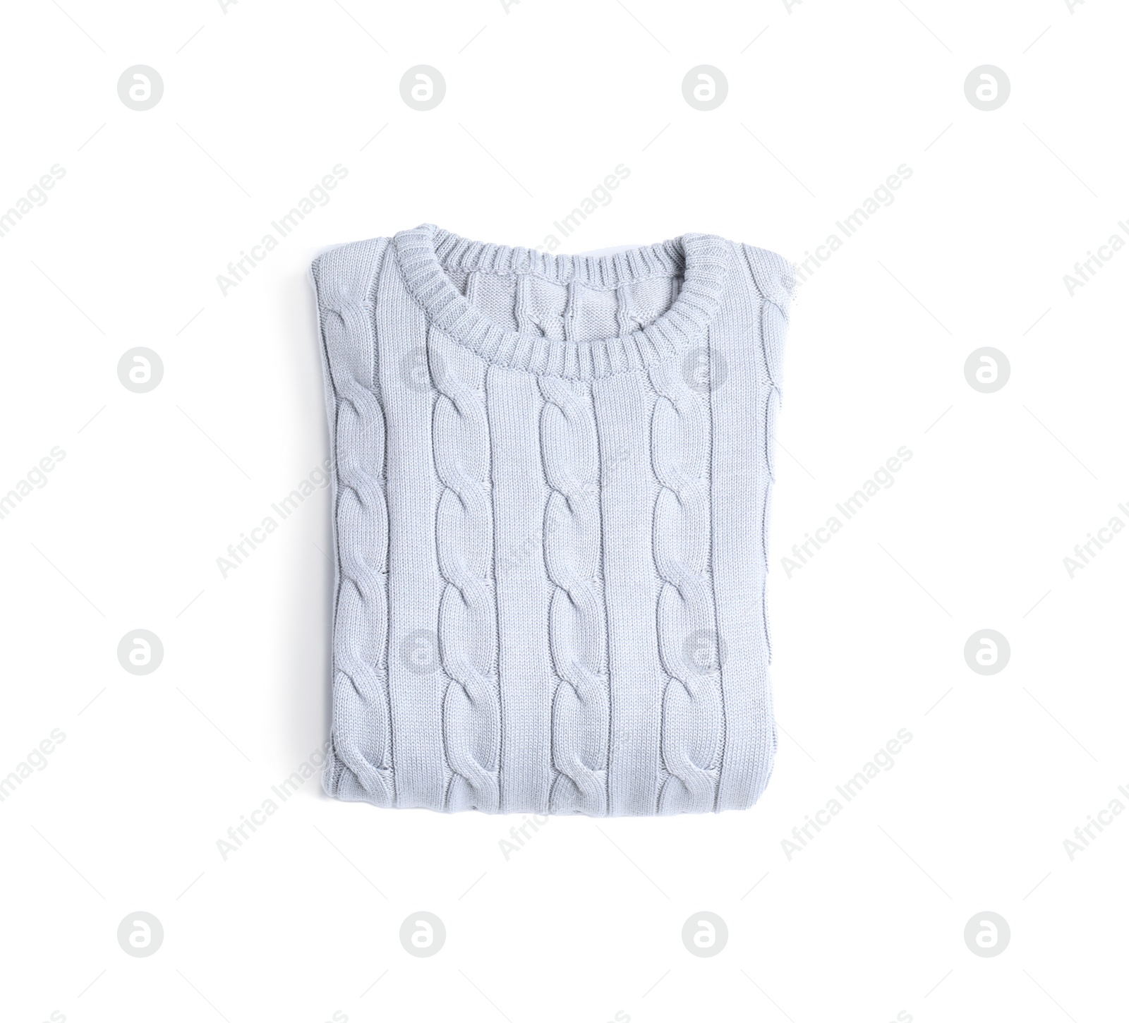 Photo of Folded knitted sweater on white background, top view