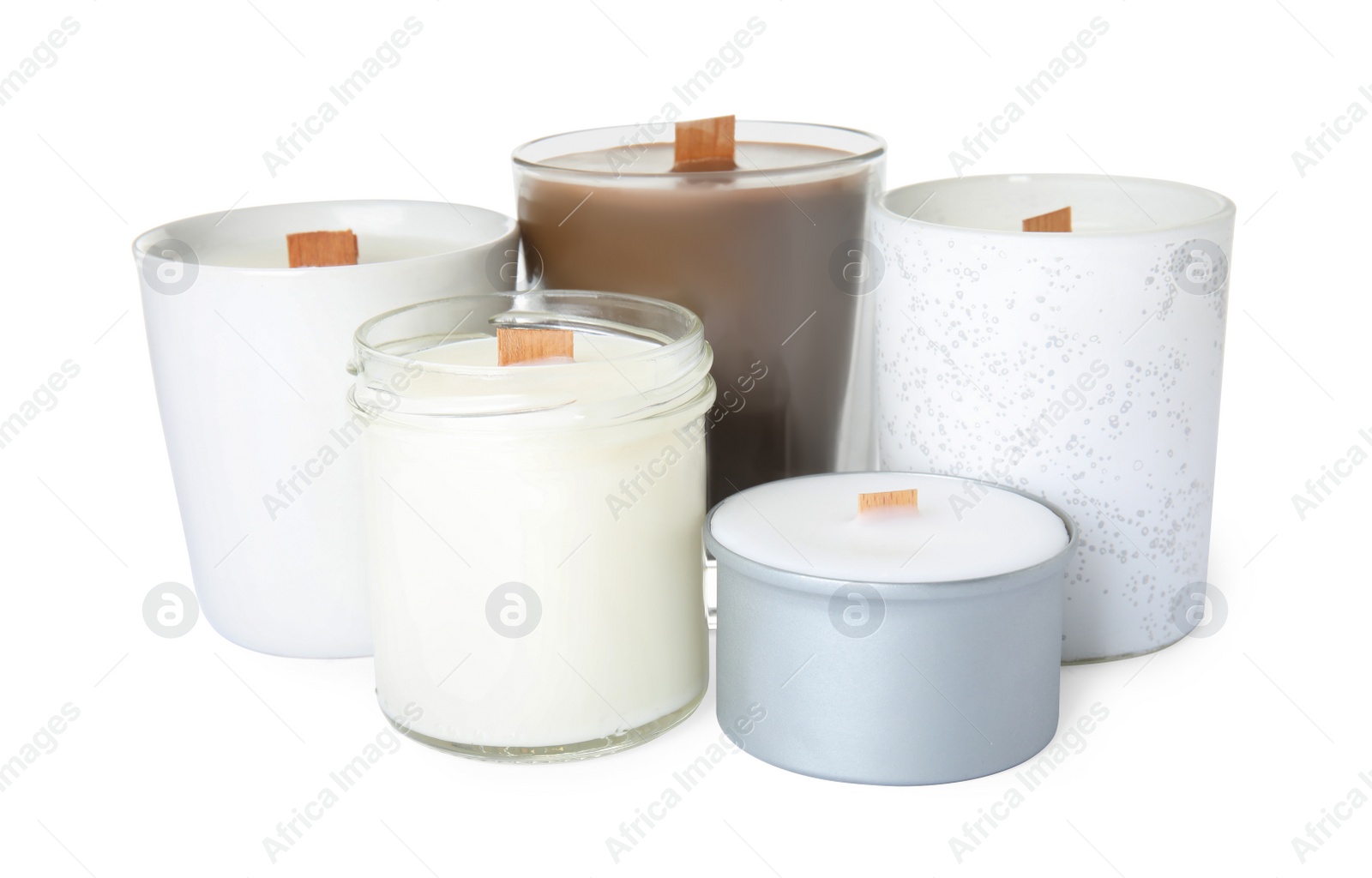 Photo of Beautiful candles with wooden wicks on white background