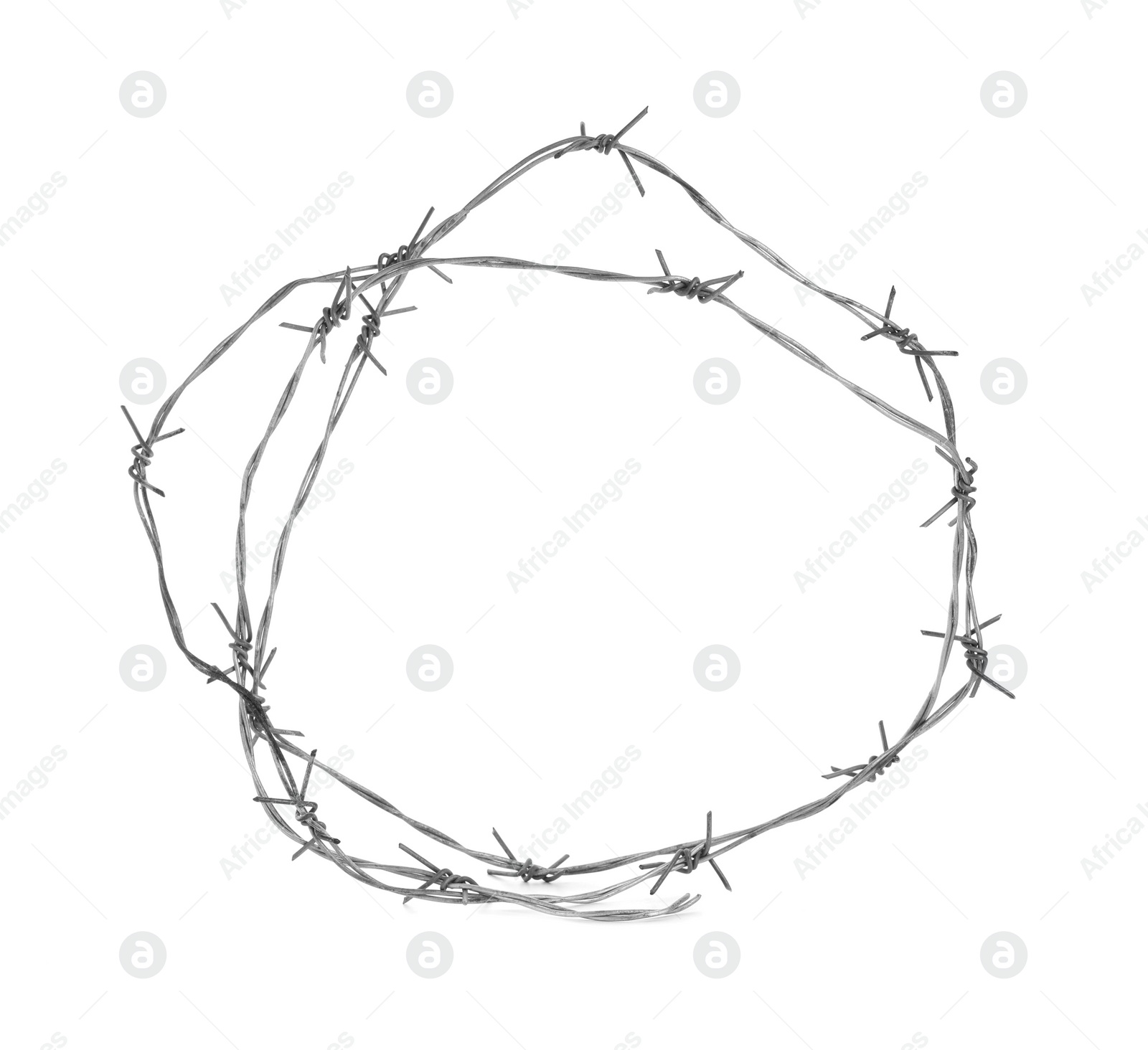 Photo of Shiny metal barbed wire isolated on white