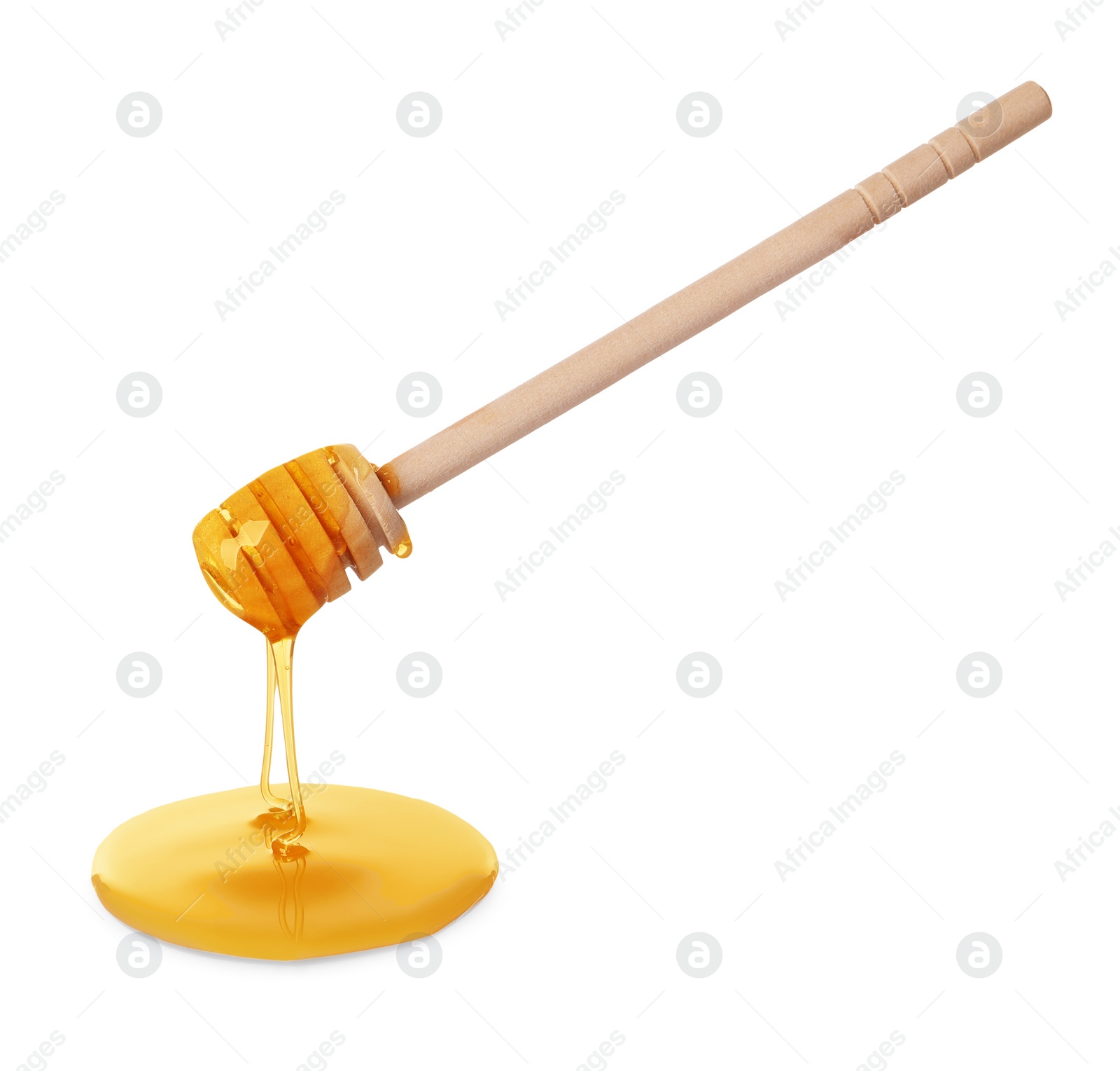 Photo of Fresh honey dripping from dipper on white background