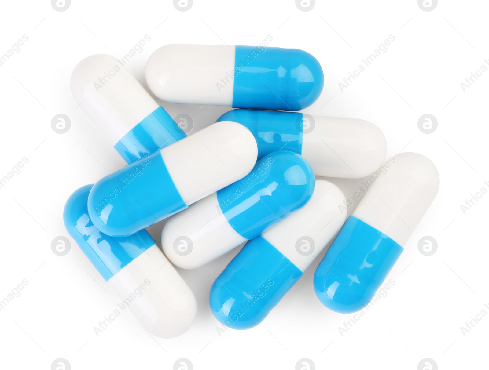 Photo of Pile of antibiotic pills isolated on white, top view