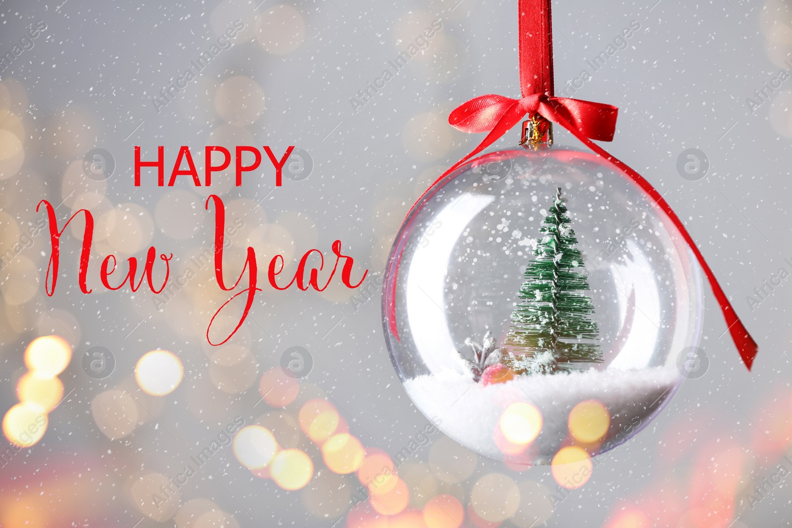 Image of Happy New Year. Beautiful glass ball with Christmas tree on light background, bokeh effect