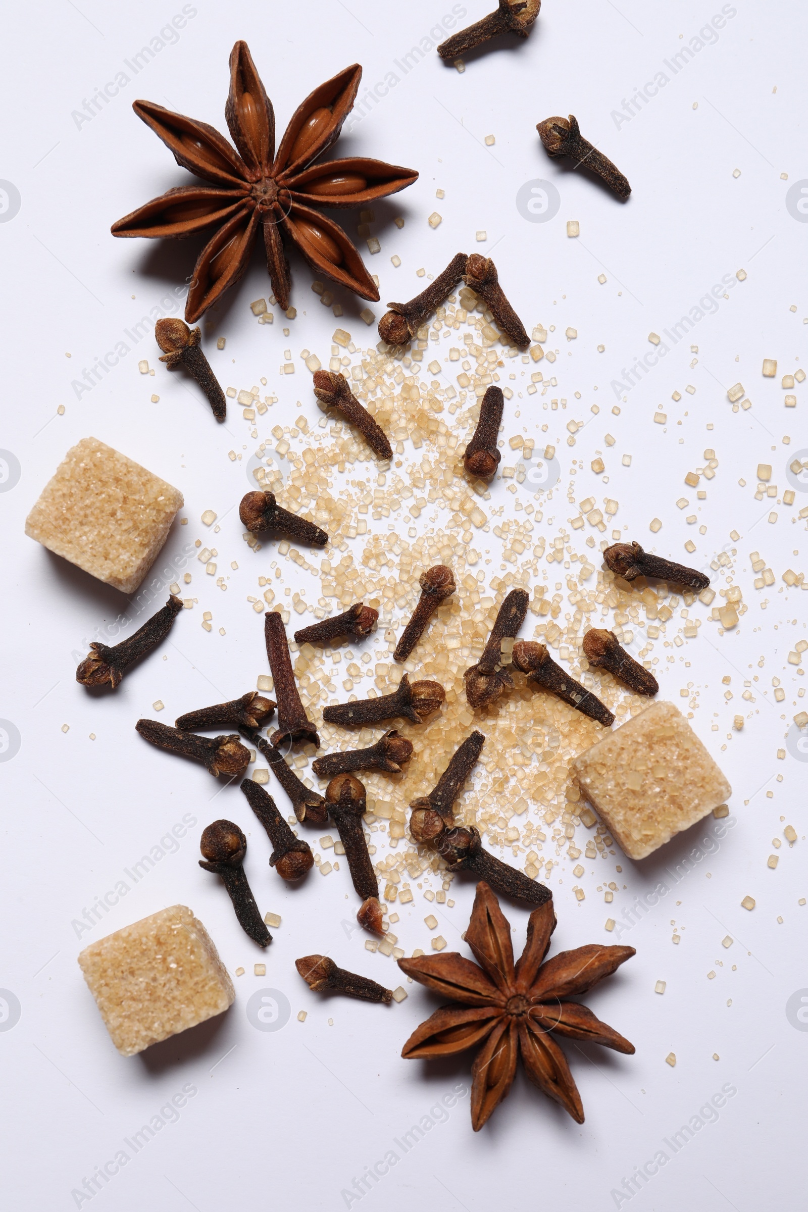 Photo of Different spices on white table, flat lay