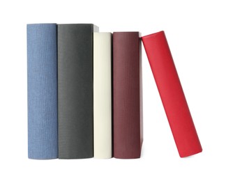 Many different hardcover books on white background