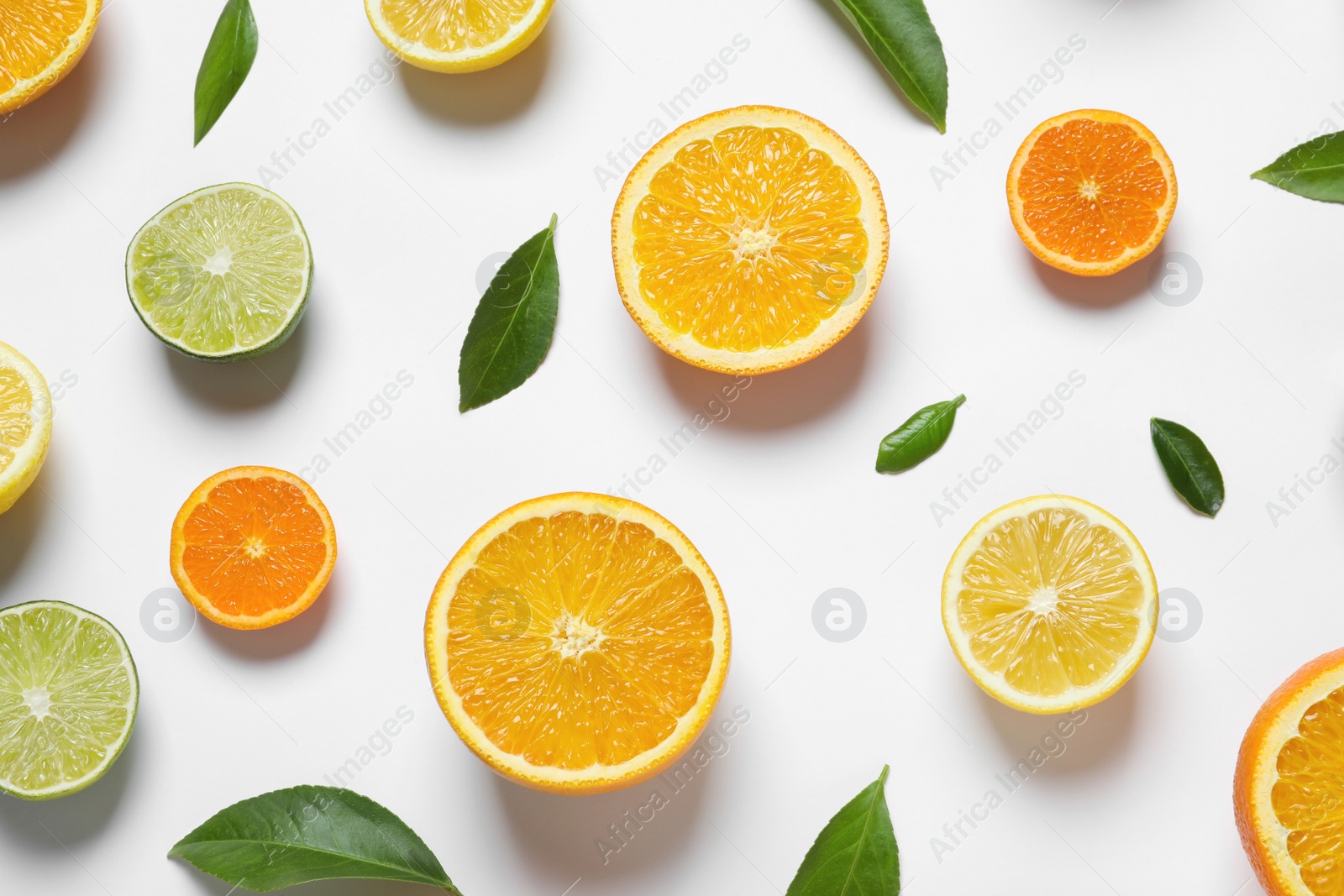 Photo of Flat lay composition with different citrus fruits on white background